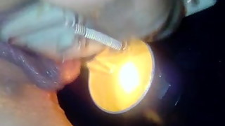 Very wet Pussy on burning candle