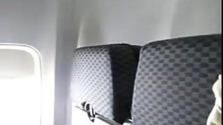 www.pornthey.com - hot milf wife fingering herself on commercial airplane
