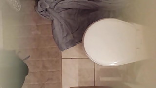 Spying on wife in bathroom